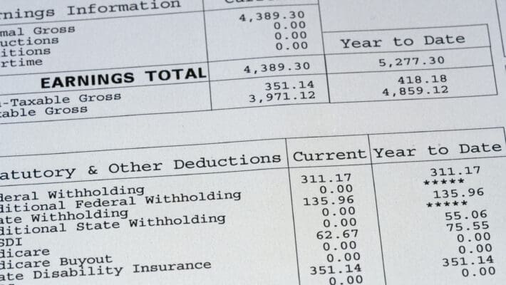 Up,Close,Of,Paystub