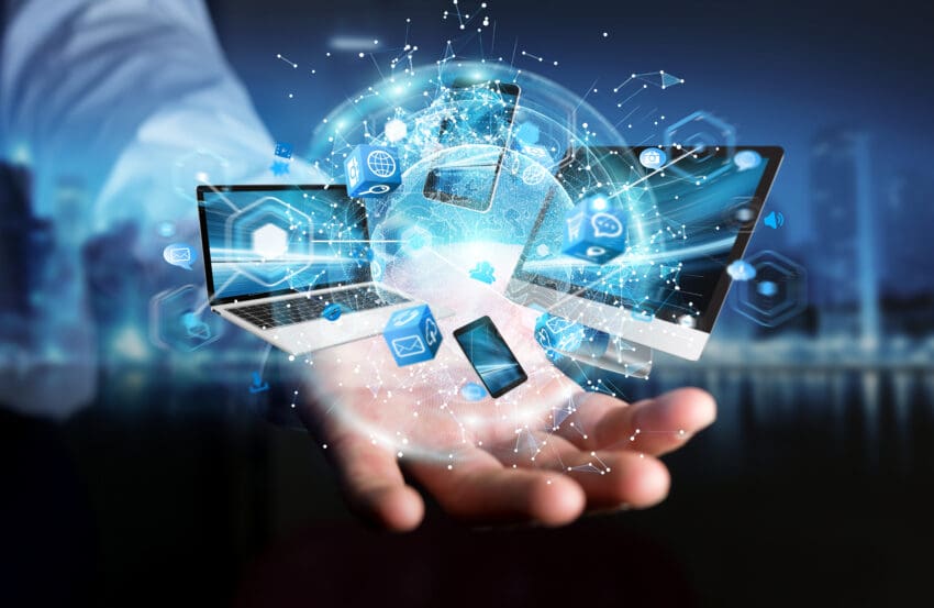 Tech,Devices,Connected,To,Each,Other,By,Businessman,On,Blurred