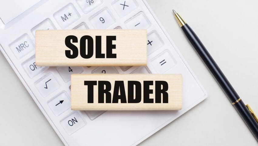 Wooden,Blocks,With,The,Sole,Trader,Iie,On,A,Light