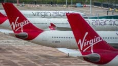 Sir Richard Branson's long-haul carrier warns the conflict with Iran and the closure of the Strait of Hormuz have "upended" its plans to the end of the decade, with consumer confidence on transatlantic routes already dented by the White House trade agenda.