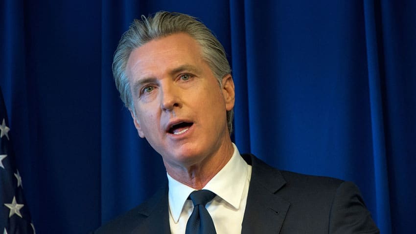 Gavin Newsom has signed a California social media law barring addictive features for under-16s, alongside new AI chatbot rules, in a package of 13 bills.
